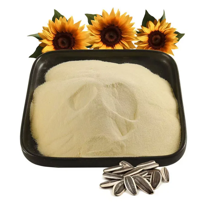Sunflower seeds and sunflowers beside PS powder