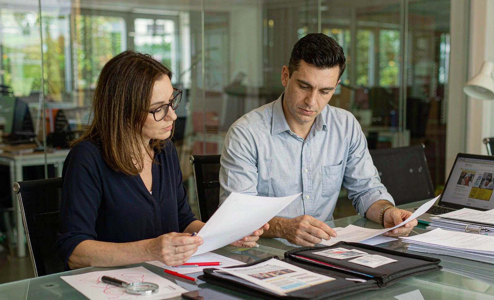 Marketing and quality team reviewing cognitive health claim wording on printed label drafts